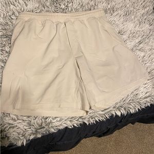Slightly used Cream/white lululemon pace breaker shorts
